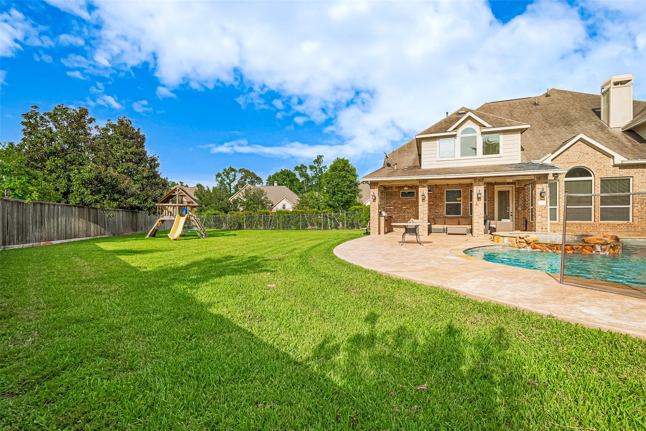 19 Sandwell Place Spring, TX 77389 - Photo 50 of 50 Massive backyard with plenty of space for recreation or gardening.