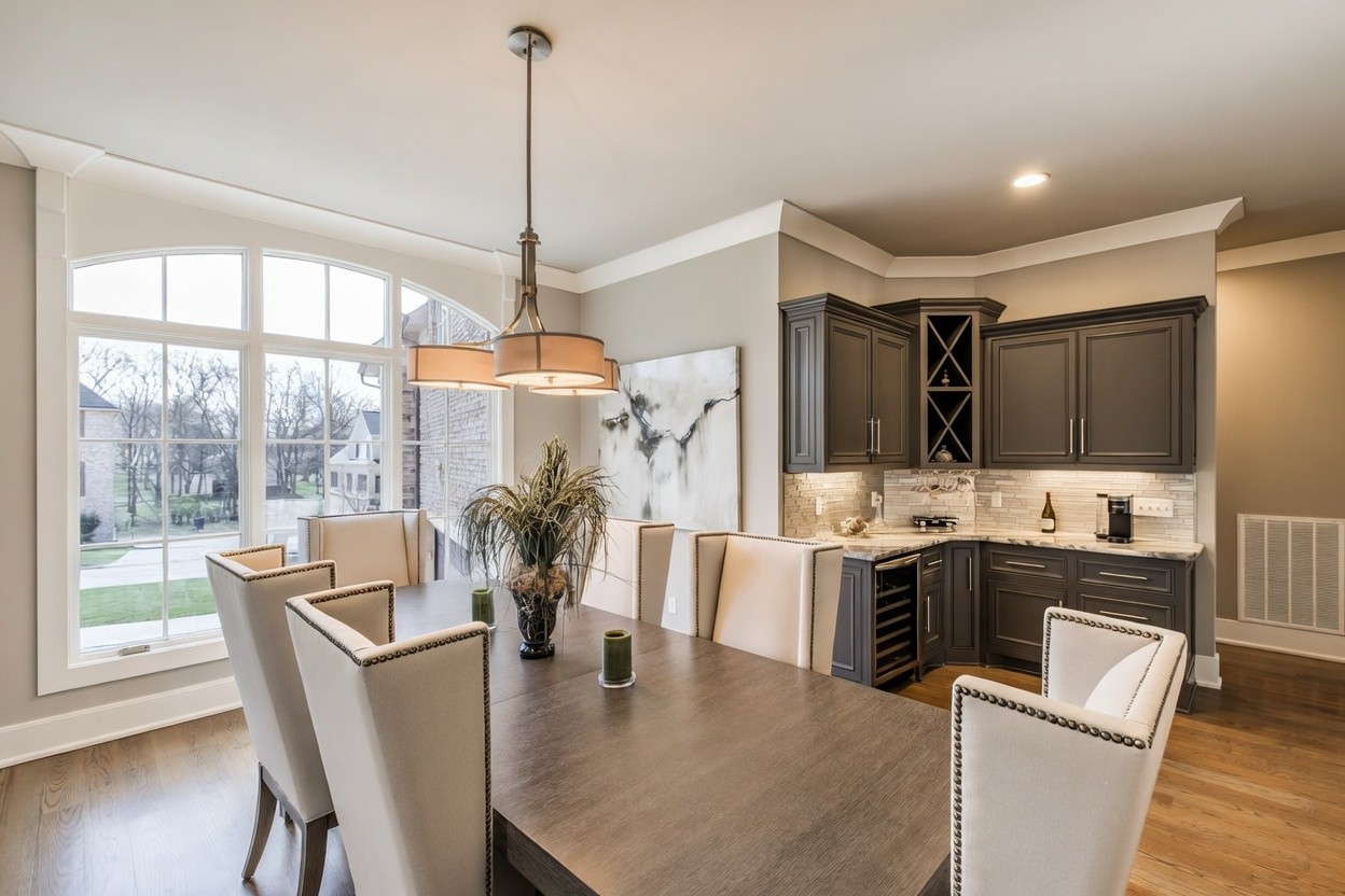 1032 Kendras Run Gallatin, TN 37066 - Photo 15 of 48 a dining room with furniture a chandelier and wooden floor