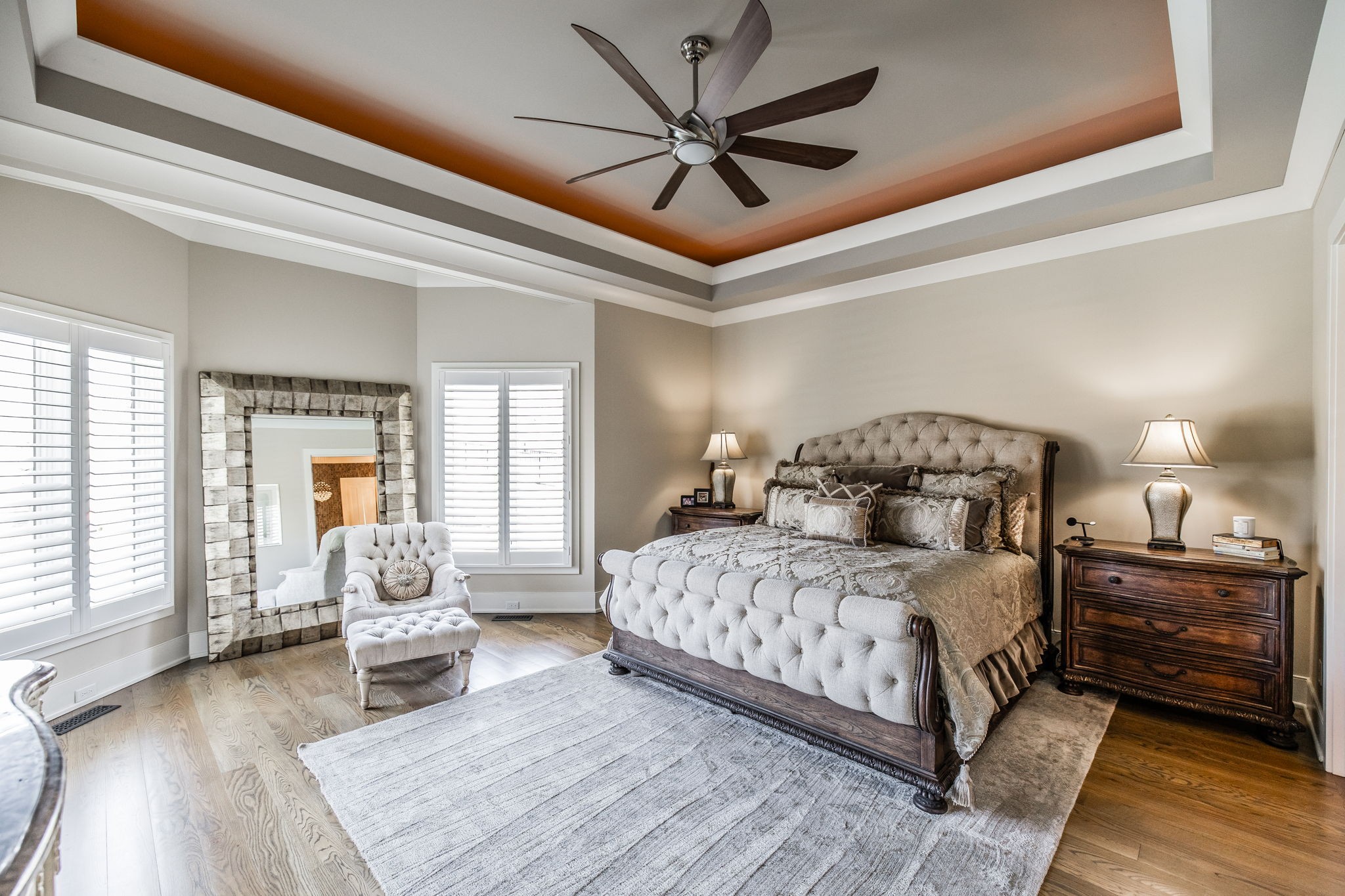 1032 Kendras Run Gallatin, TN 37066 - Photo 19 of 48 a bedroom with a large bed a chandelier and windows