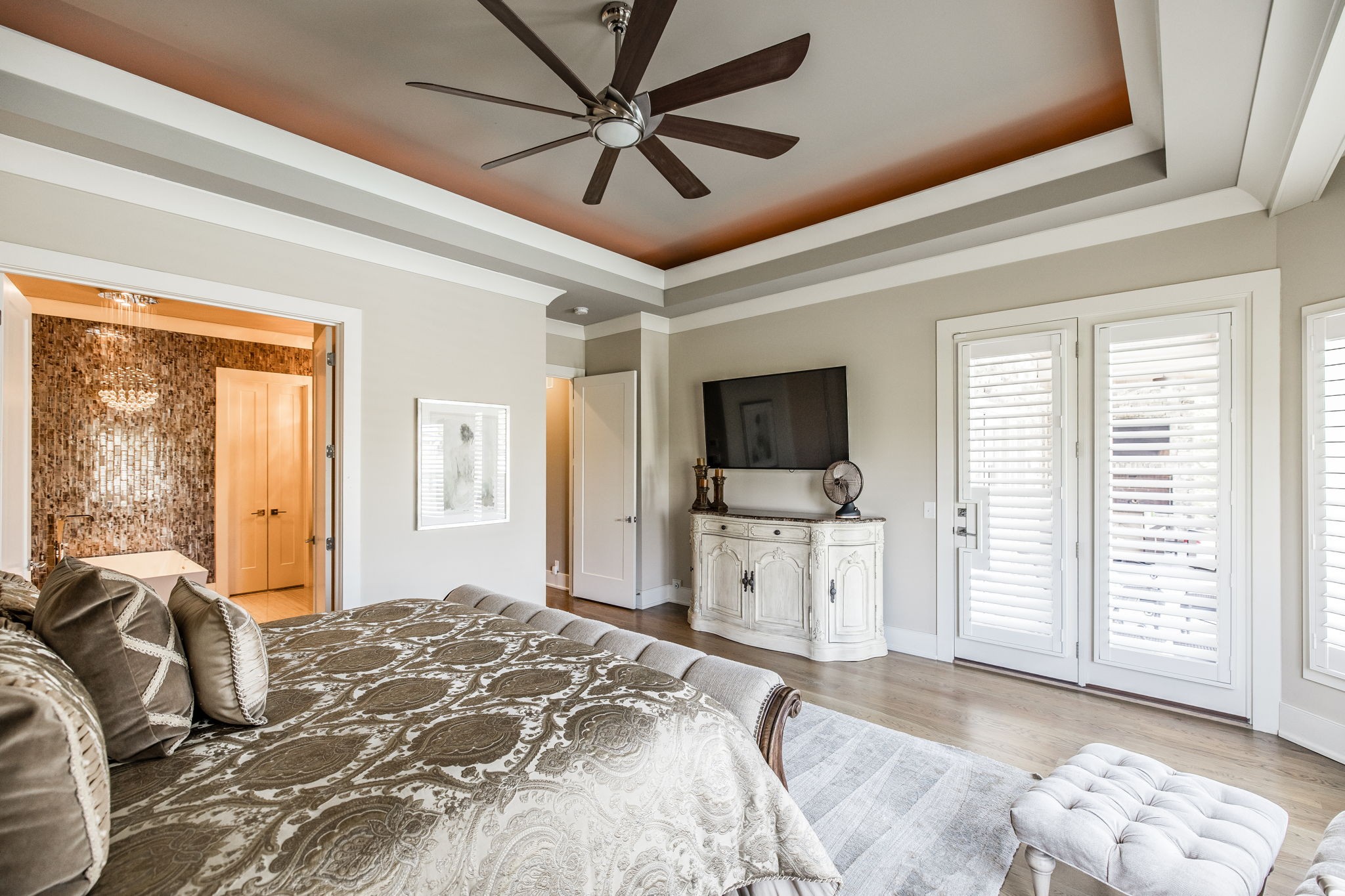 1032 Kendras Run Gallatin, TN 37066 - Photo 20 of 48 a bedroom with a large bed a flat screen tv and a window