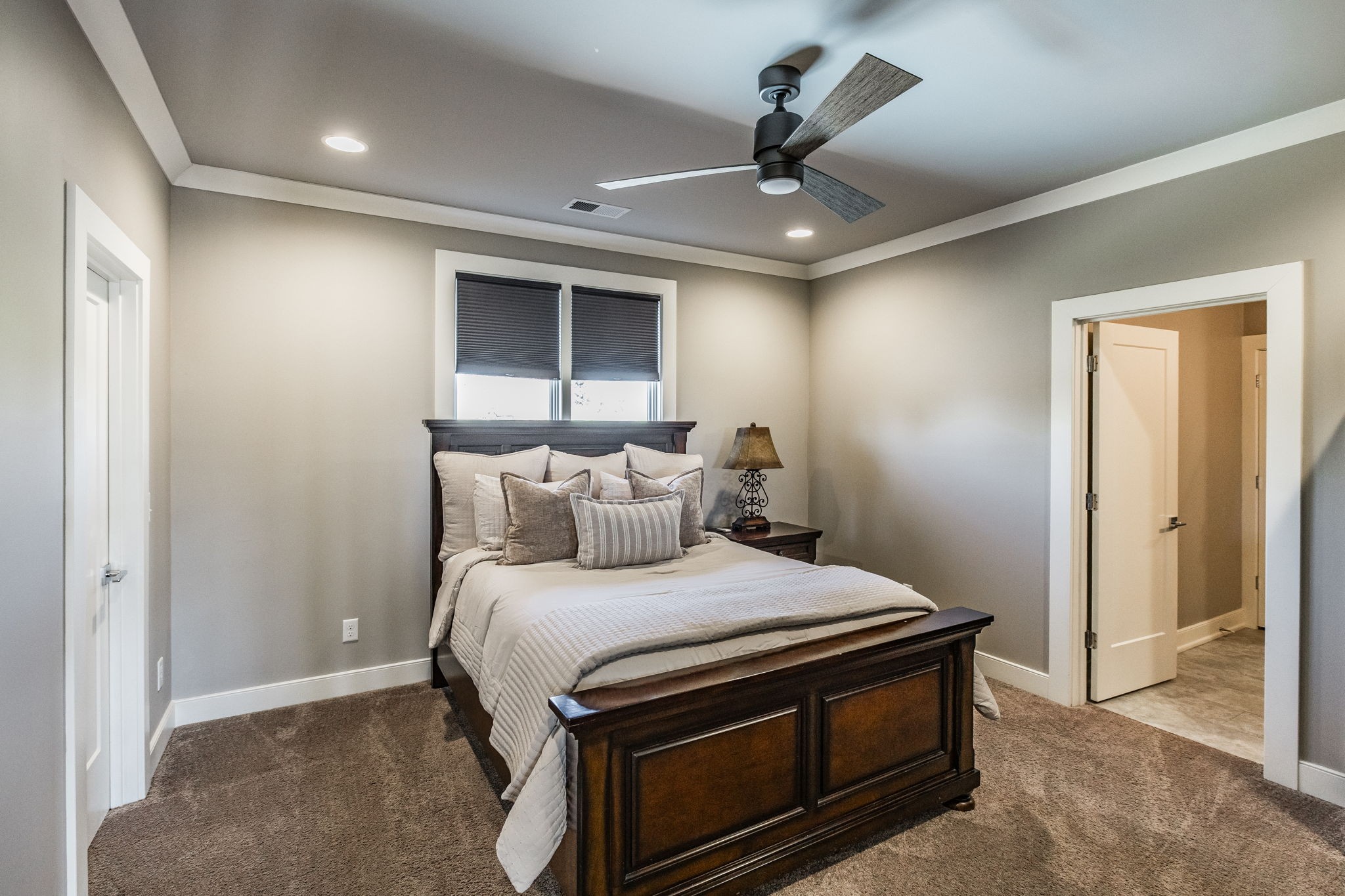 1032 Kendras Run Gallatin, TN 37066 - Photo 29 of 48 a bedroom with a bed and a ceiling fan