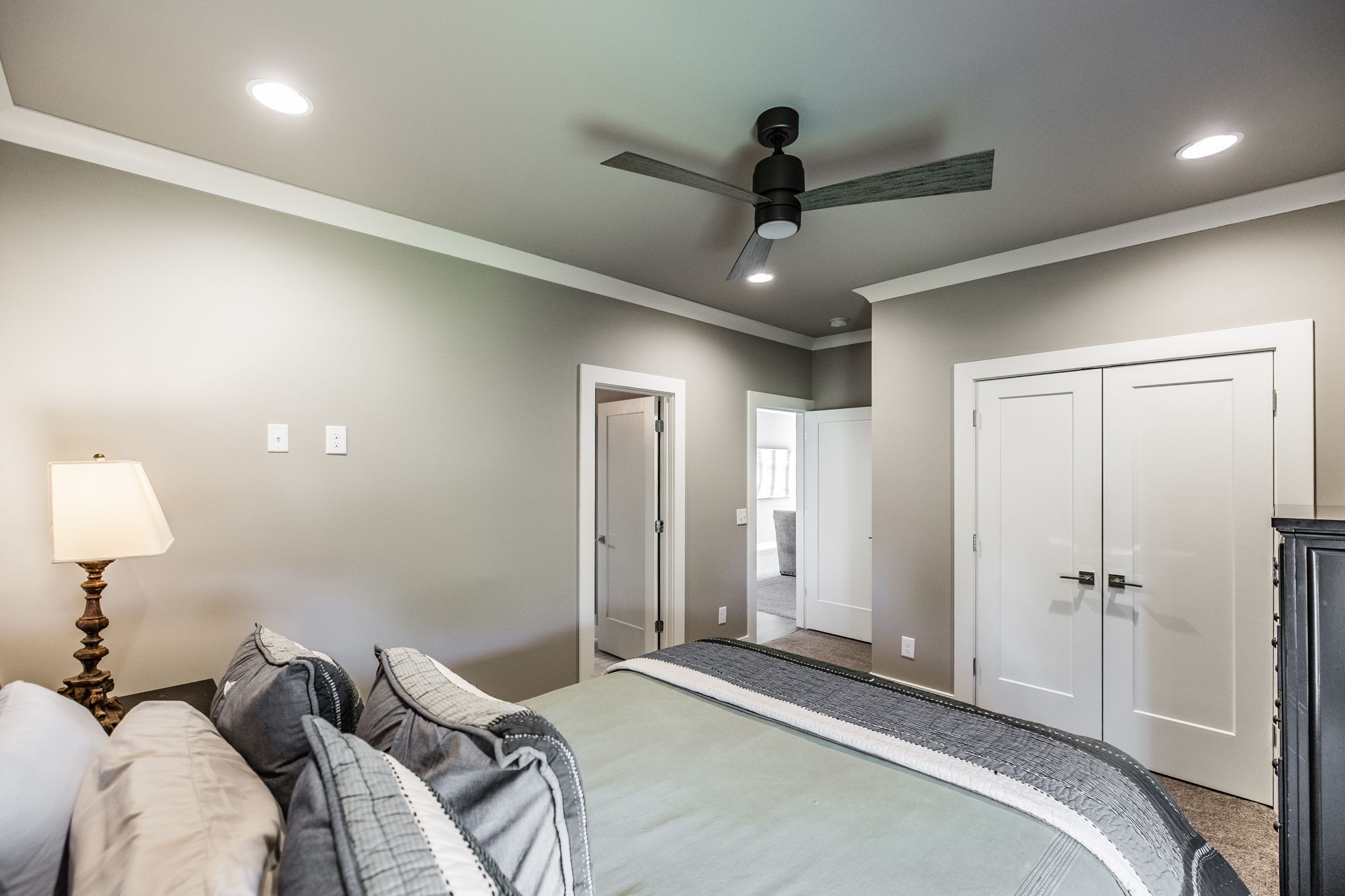 1032 Kendras Run Gallatin, TN 37066 - Photo 31 of 48 a bedroom with a bed and a lamp