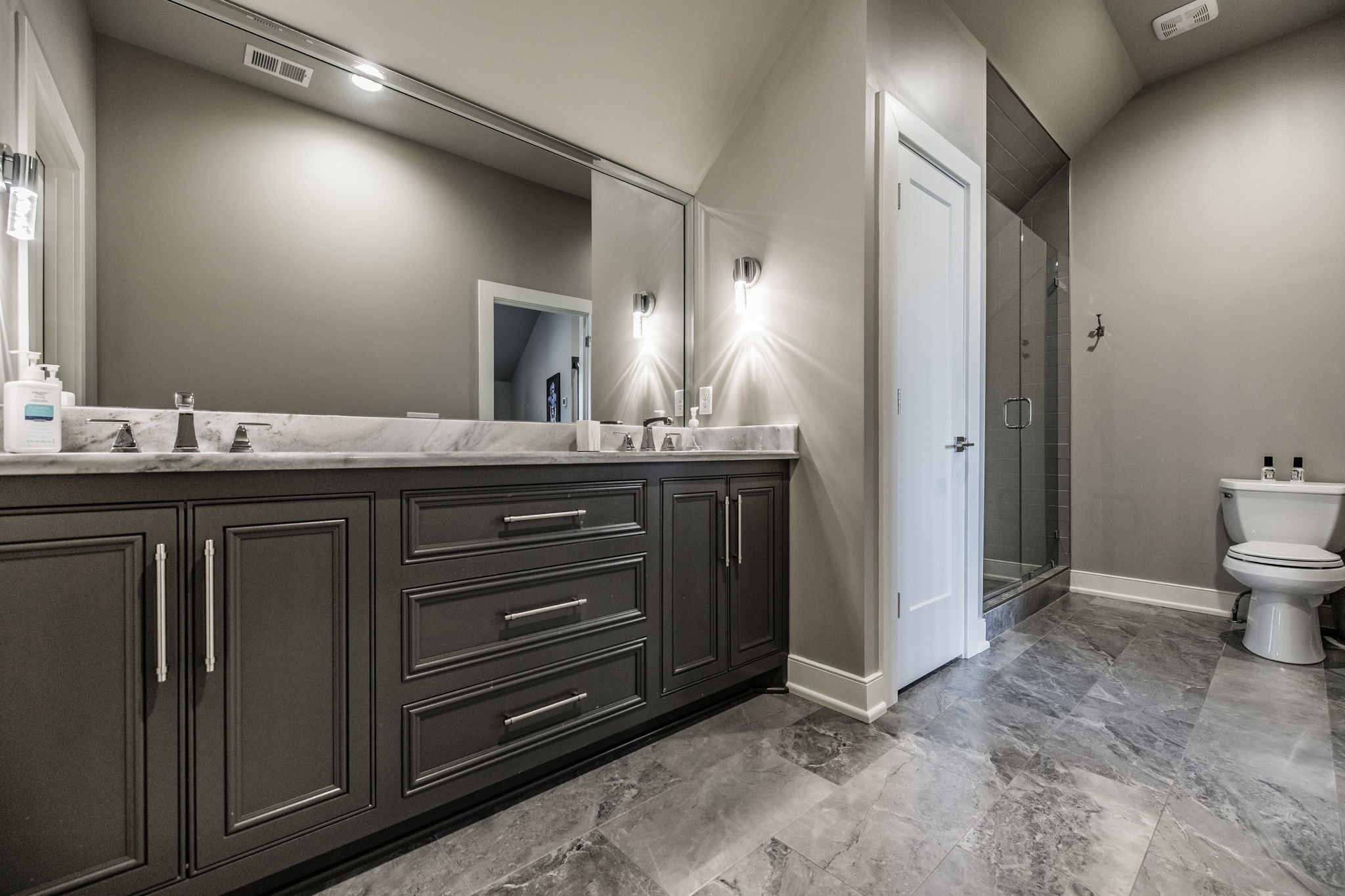 1032 Kendras Run Gallatin, TN 37066 - Photo 36 of 48 a bathroom with a granite countertop sink and a toilet