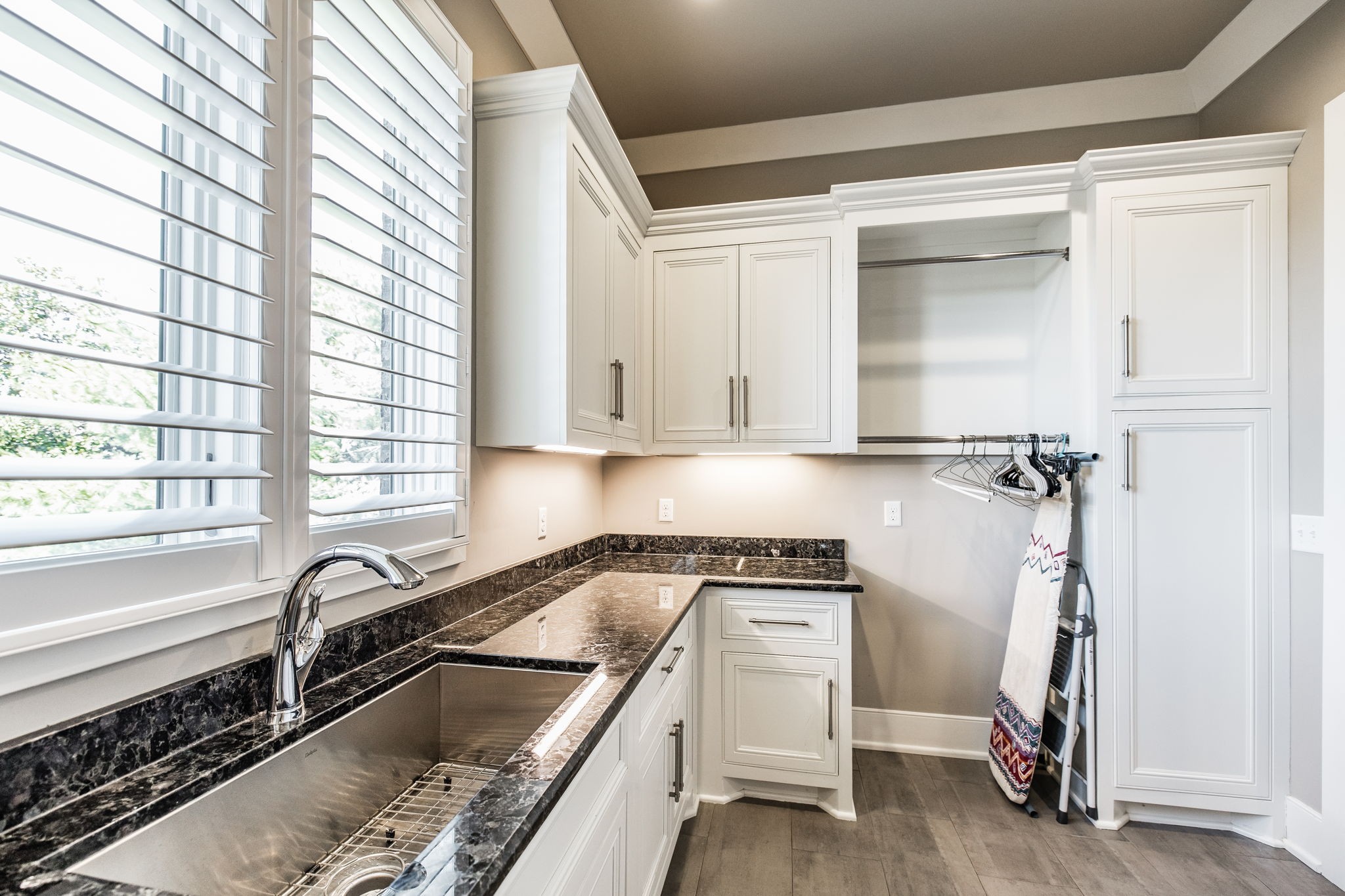 1032 Kendras Run Gallatin, TN 37066 - Photo 37 of 48 a kitchen with a sink a stove and cabinets