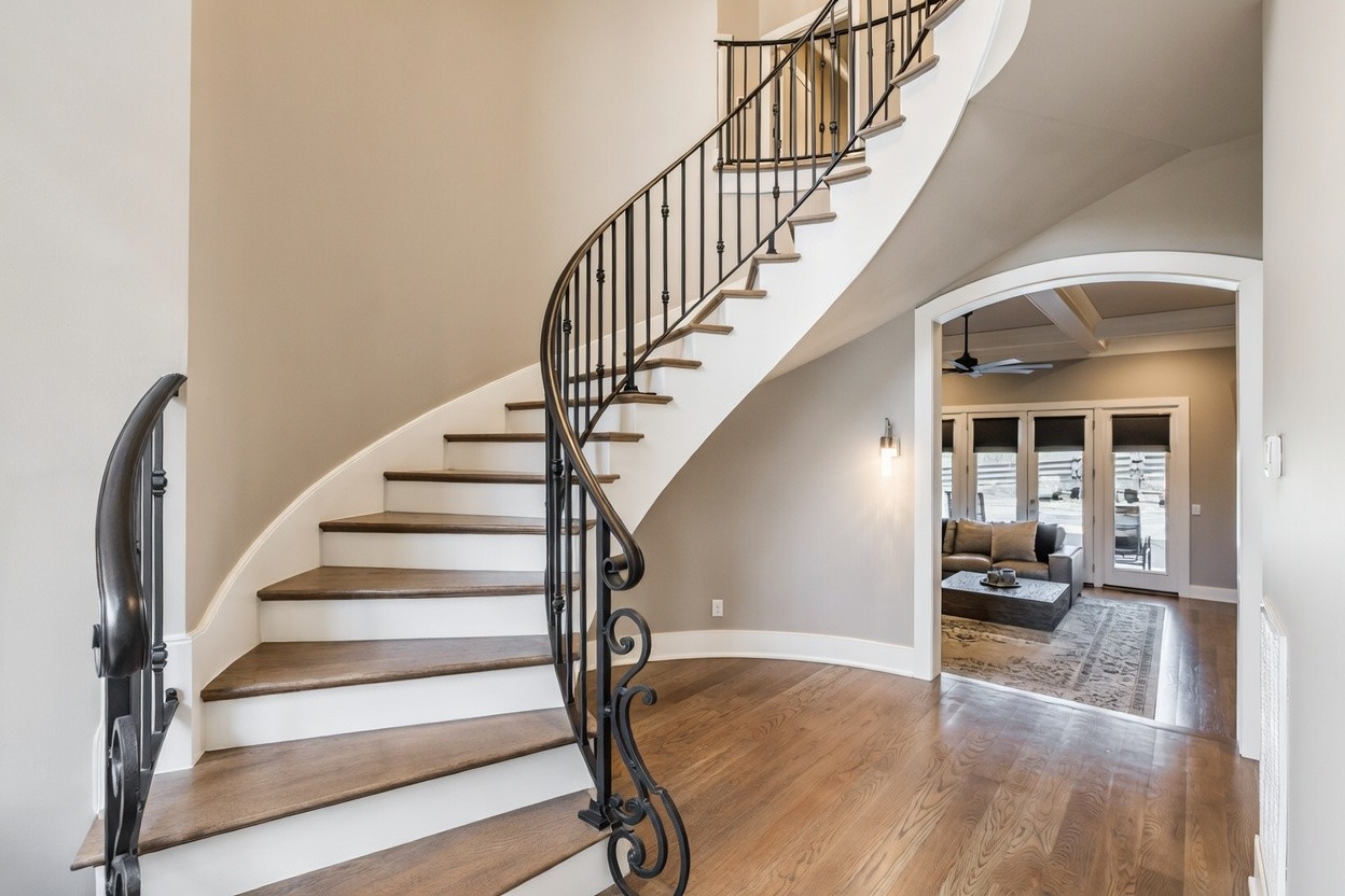 1032 Kendras Run Gallatin, TN 37066 - Photo 6 of 48 a view of staircase with wooden floor and a rug