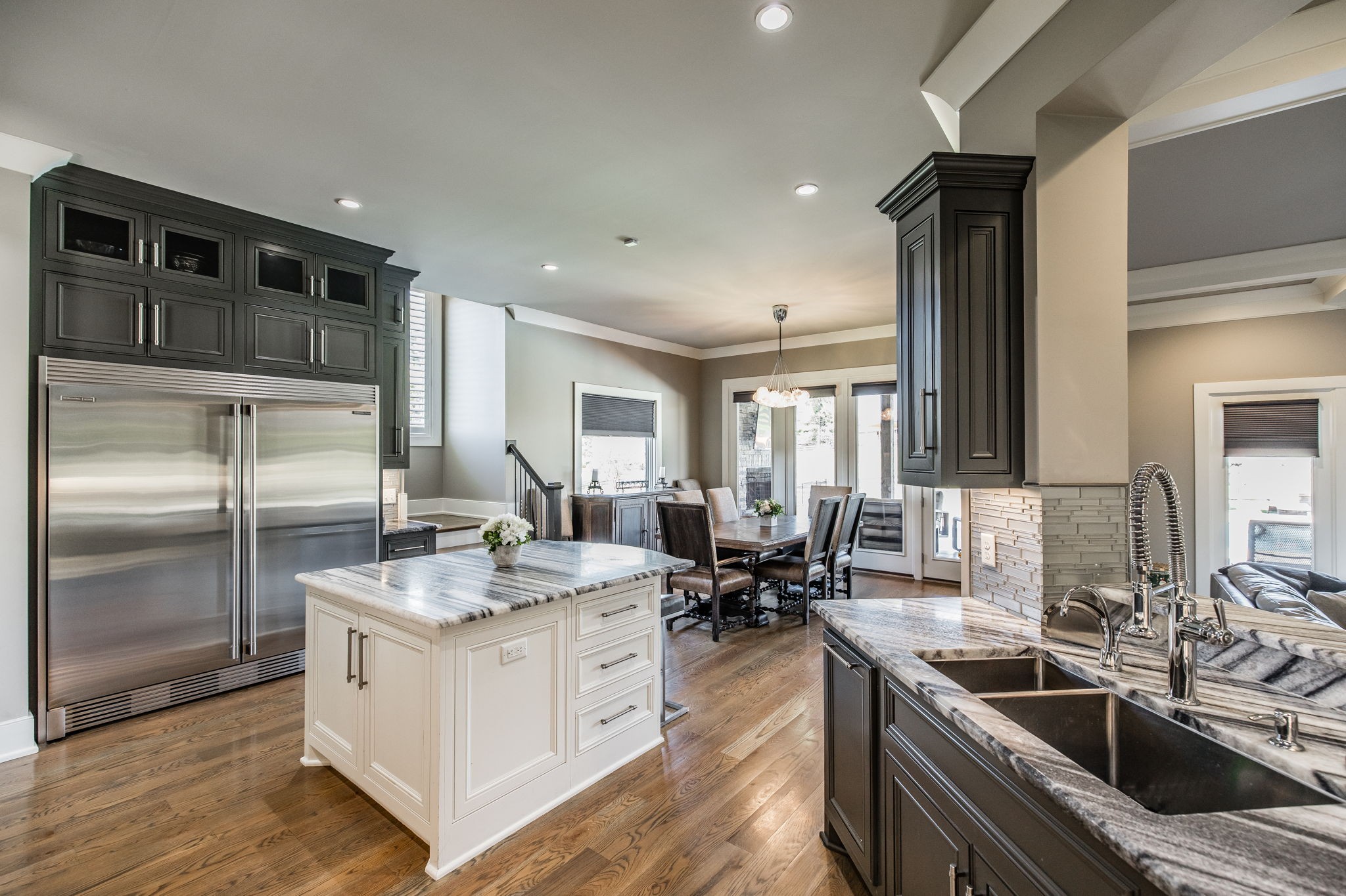 1032 Kendras Run Gallatin, TN 37066 - Photo 7 of 48 a kitchen with stainless steel appliances granite countertop a sink stove and refrigerator