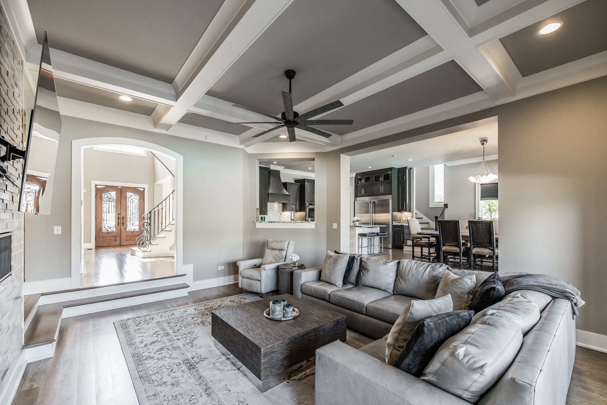 1032 Kendras Run Gallatin, TN 37066 - Photo 9 of 48 a living room with furniture ceiling fan and a rug
