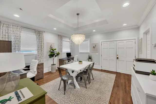 a view of a dining room with furniture