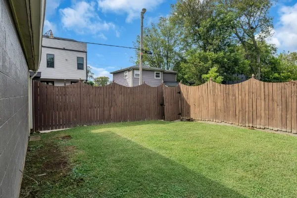 a view of a back yard of the house