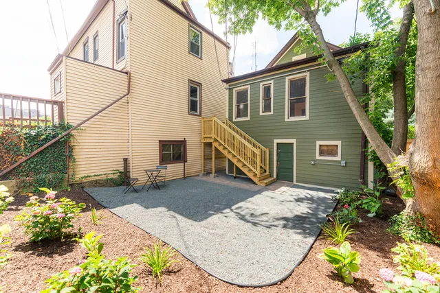 a view of a backyard with a garden