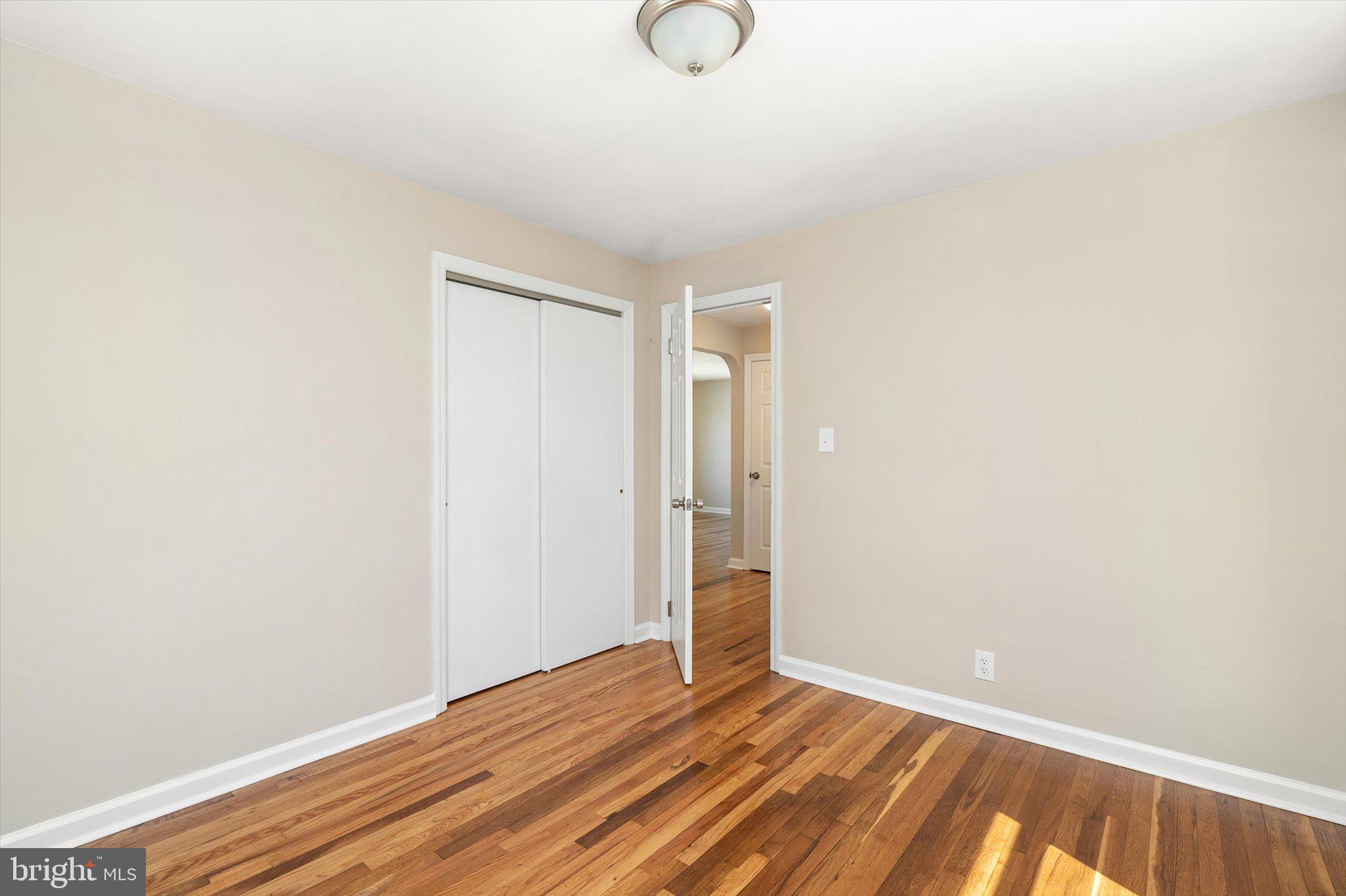 40 Unwin Drive Hamilton, NJ 08610 - Photo 16 of 26 a view of a room with wooden floor and white walls