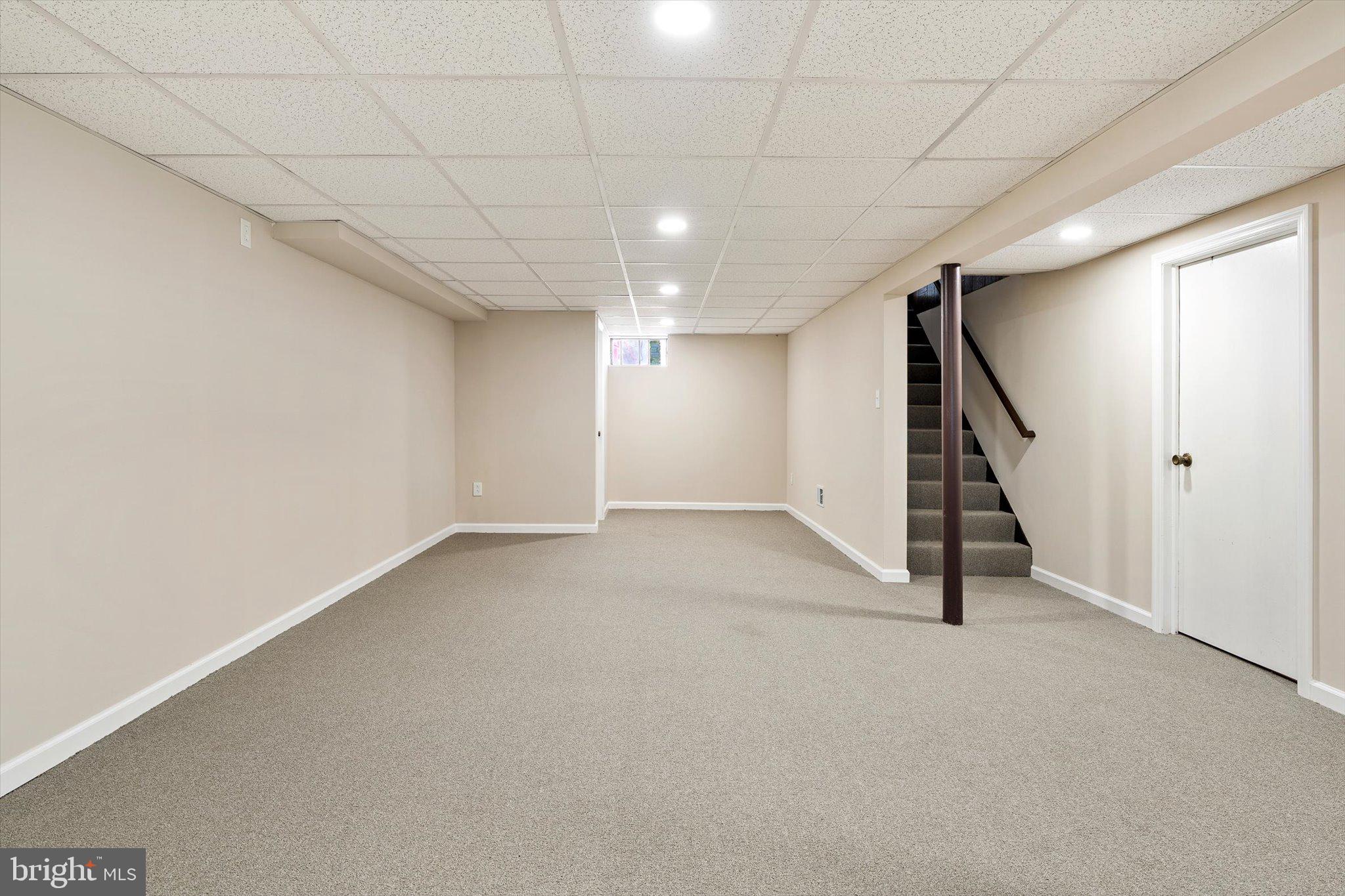 40 Unwin Drive Hamilton, NJ 08610 - Photo 22 of 26 a view of an empty room with stairs