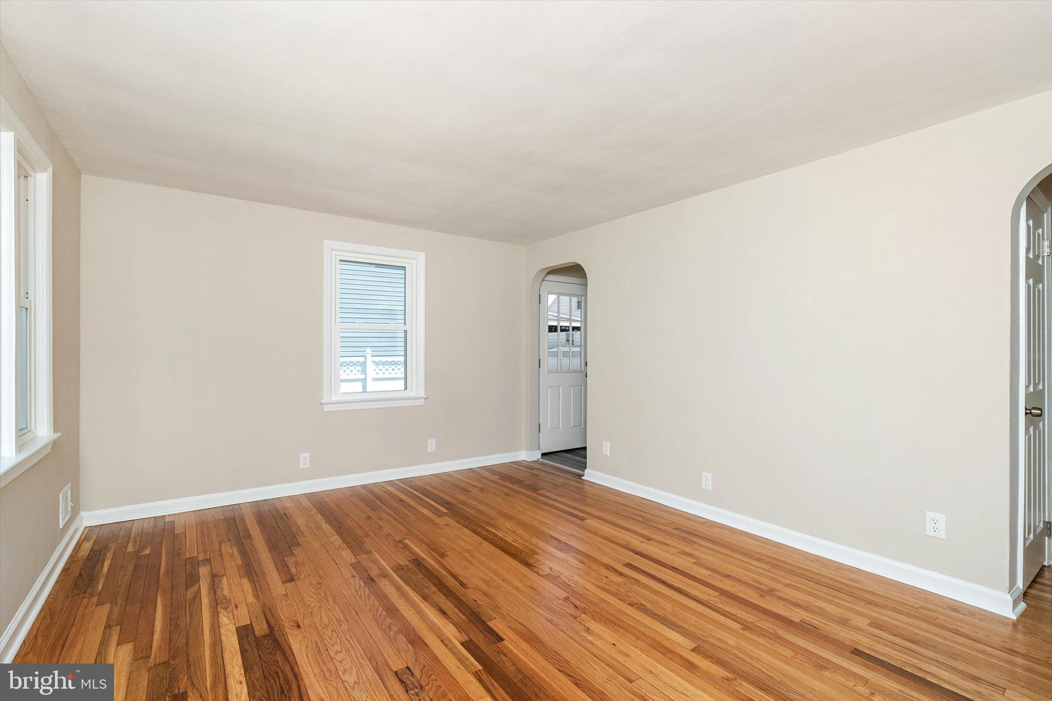 40 Unwin Drive Hamilton, NJ 08610 - Photo 5 of 26 a view of an empty room with wooden floor