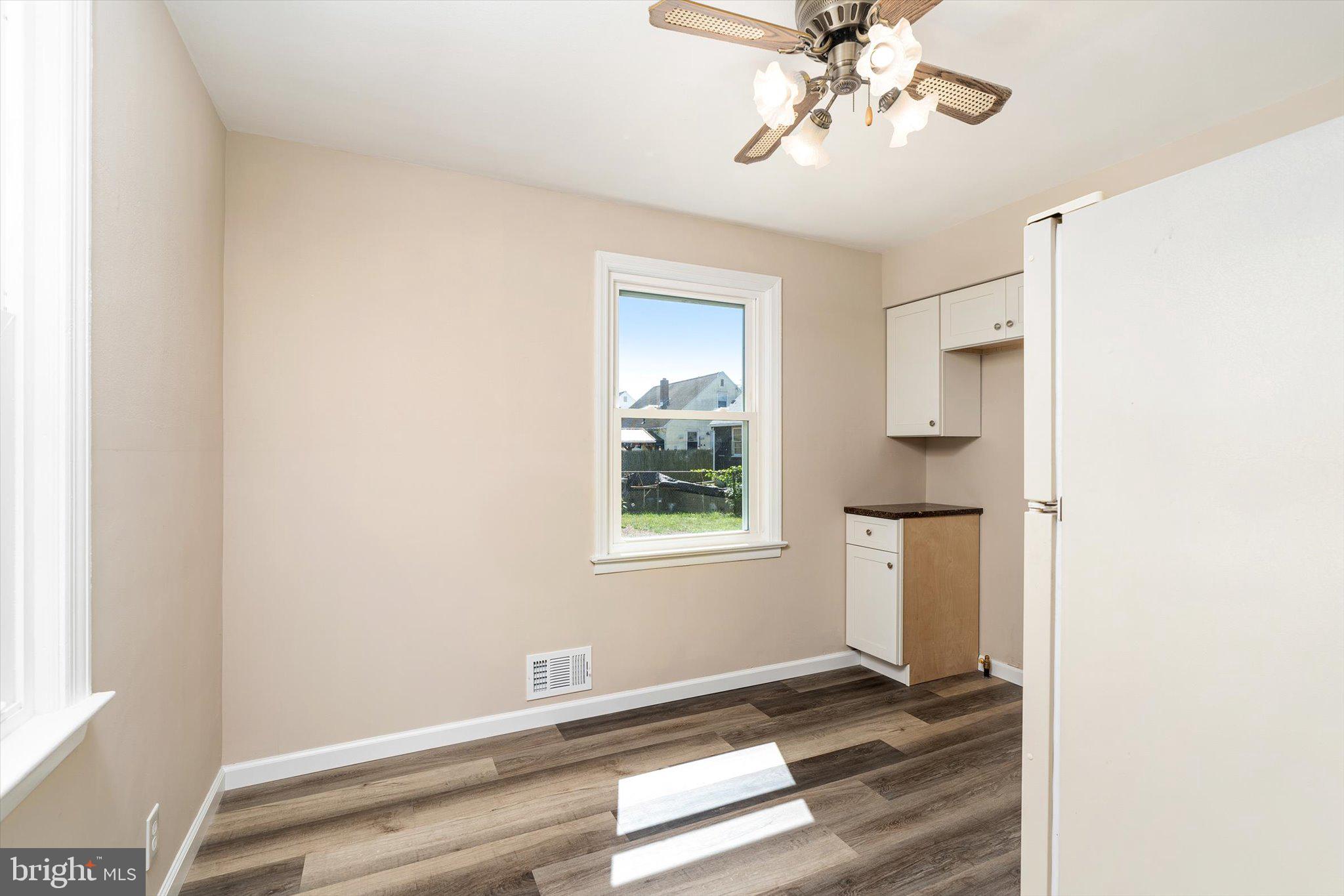 40 Unwin Drive Hamilton, NJ 08610 - Photo 8 of 26 a view of an empty room with a window