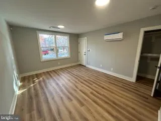 a view of an empty room and window