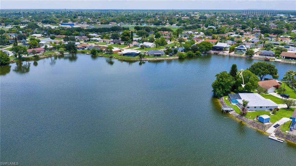 3065 50th Lane Southwest Naples, FL 34116 - Photo 28 of 31 an aerial view of city lake and trees all around