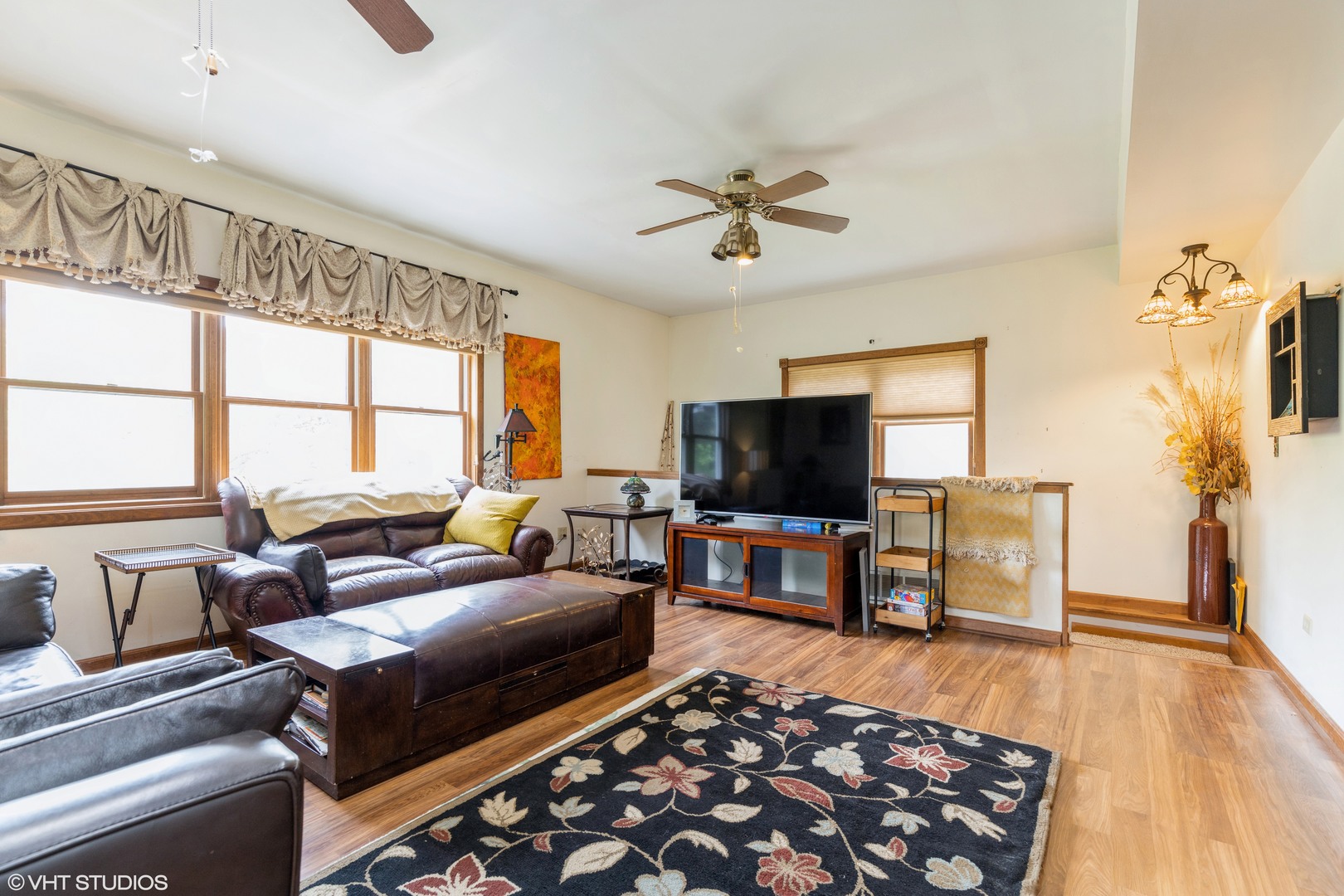 35W461 Country School Road Dundee, IL 60102 - Photo 11 of 32 a living room with furniture and a flat screen tv