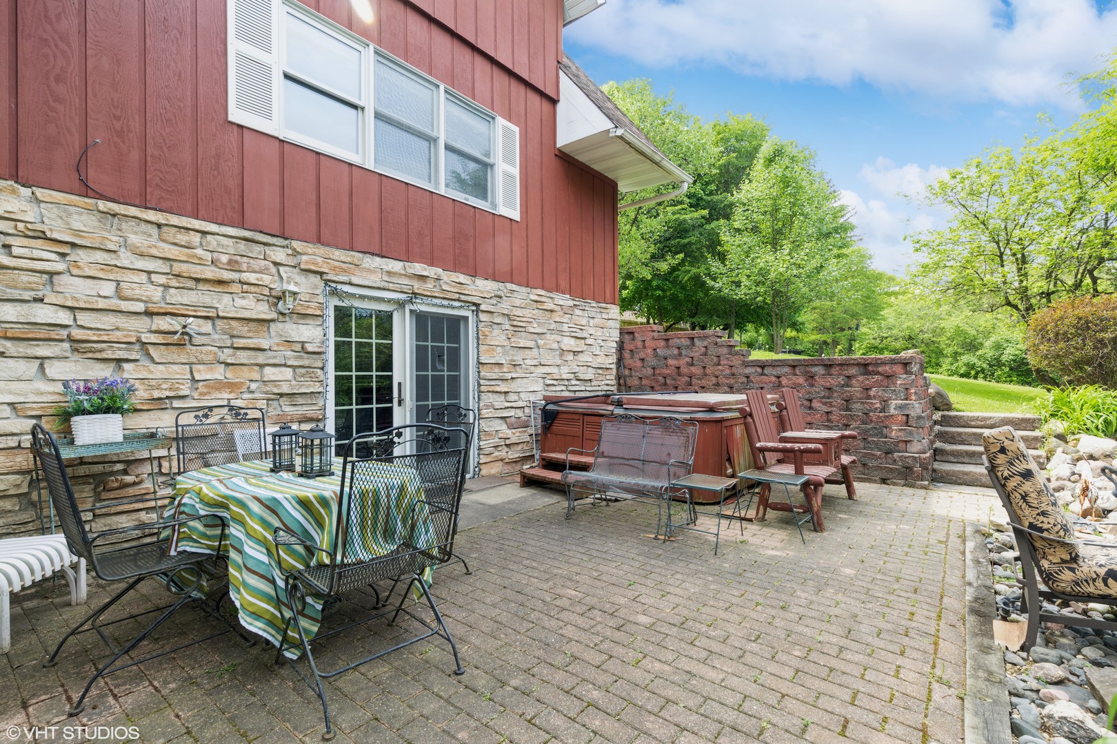 35W461 Country School Road Dundee, IL 60102 - Photo 30 of 32 a backyard of a house with dining table and chairs