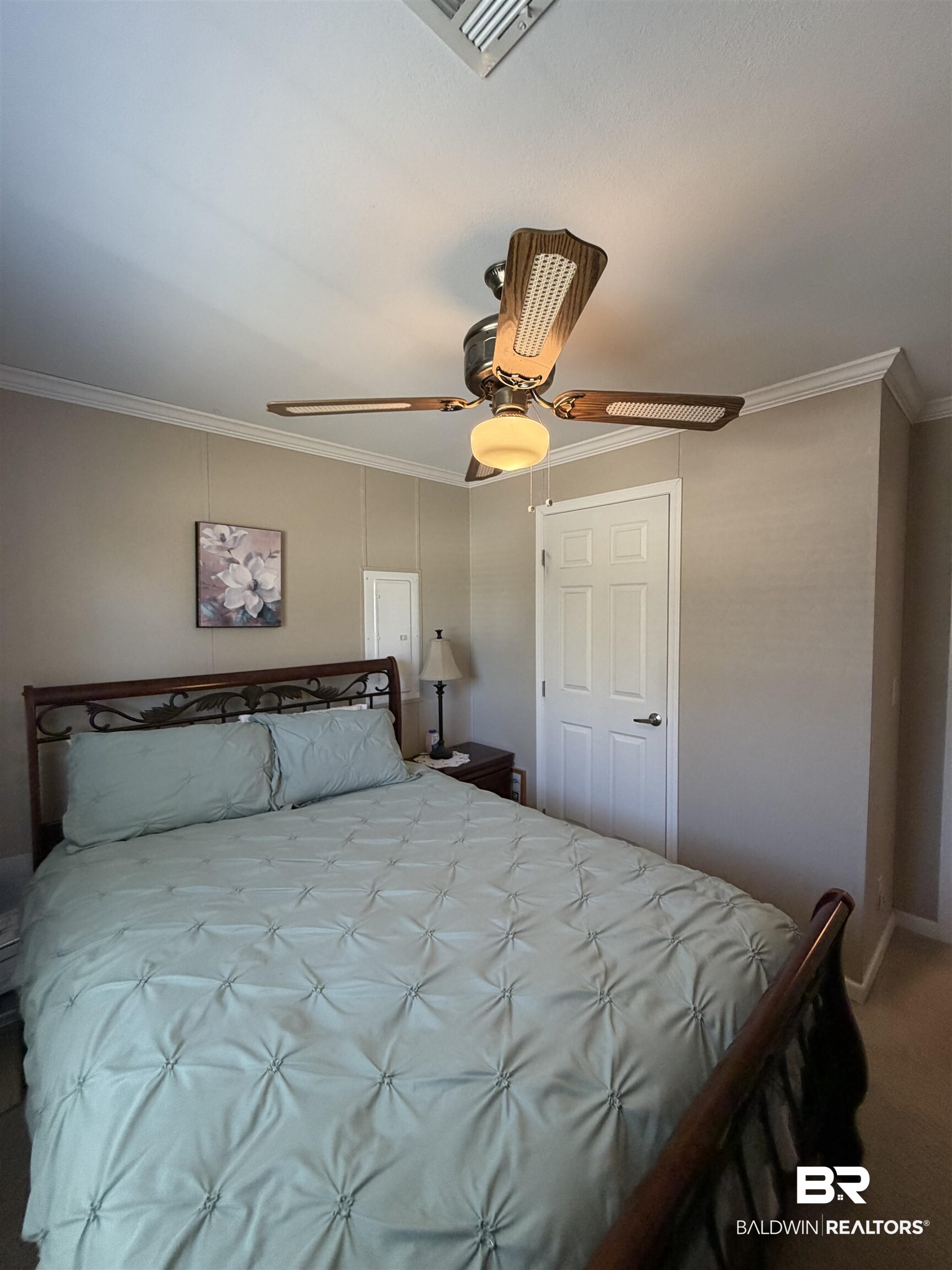 675 Escambia Loop Lillian, AL 36549 - Photo 16 of 44 Bedroom with crown molding, carpet flooring, and a ceiling fan