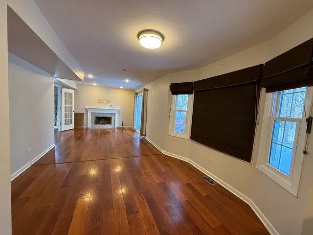 a view of a livingroom with wooden floor