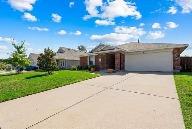 a front view of house with yard
