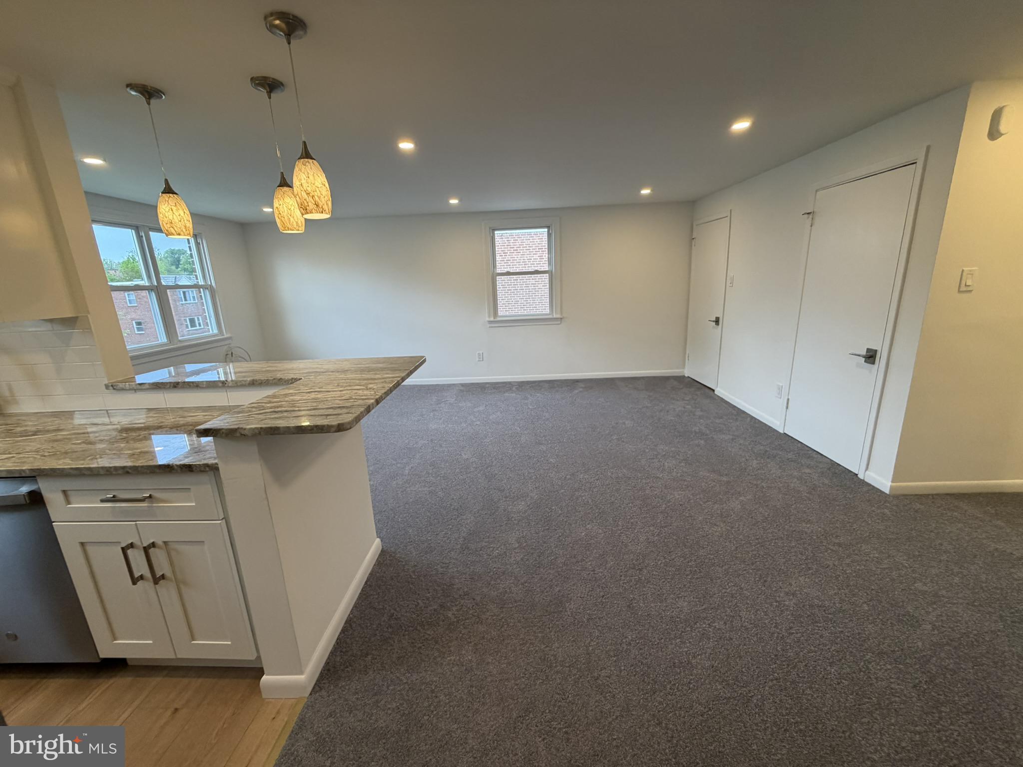 22 Windsor Road, Unit 2 Glenside, PA 19038 - Photo 4 of 29 a view of a kitchen with a sink and breakfast area