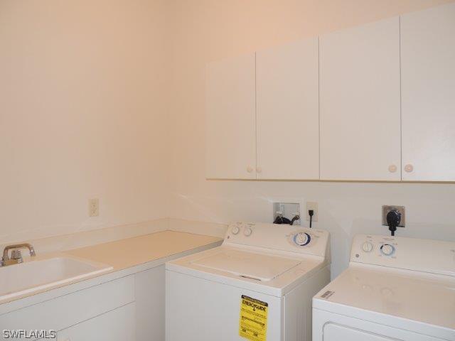 3590 Lansing Loop, Unit 201 Estero, FL 33928 - Photo 12 of 16 a bathroom with a sink and a bathtub