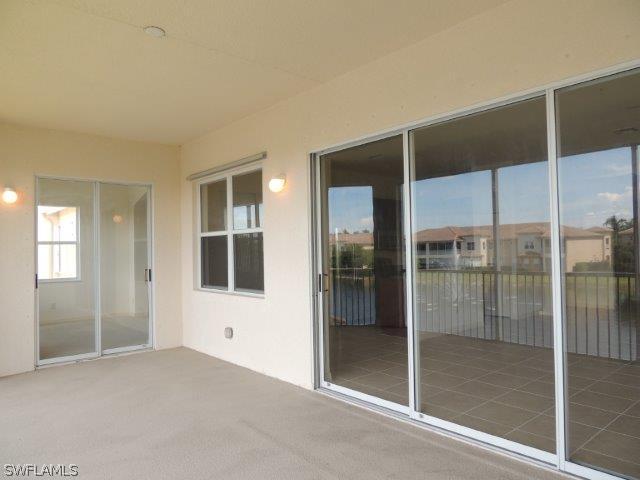 3590 Lansing Loop, Unit 201 Estero, FL 33928 - Photo 14 of 16 a view of an empty room with window