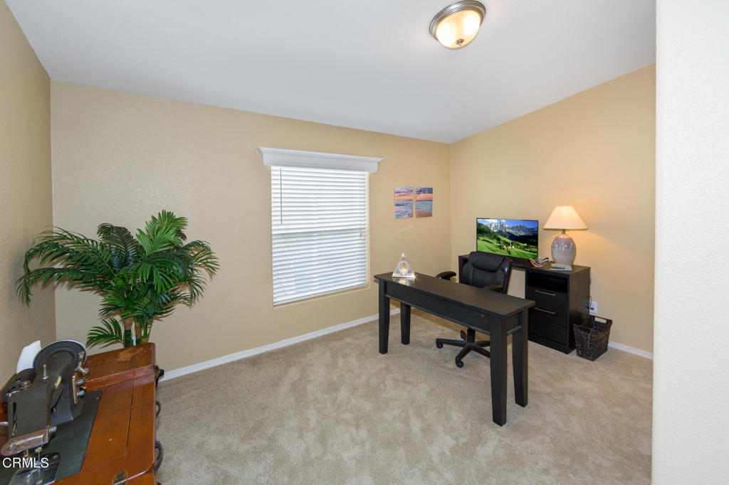 4061 Canary Lane, Unit 4061 Oxnard, CA 93033 - Photo 13 of 21 a view of a workspace with furniture and a window