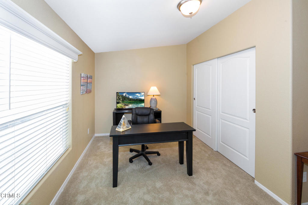 4061 Canary Lane, Unit 4061 Oxnard, CA 93033 - Photo 14 of 21 a view of a workspace with furniture