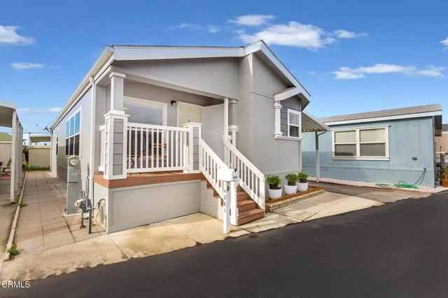 a house with trees in the background
