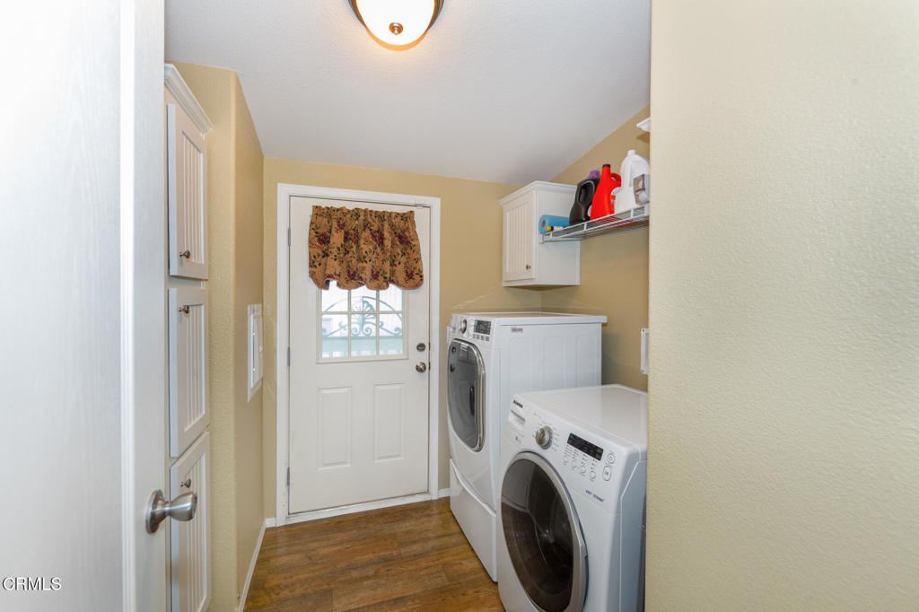 4061 Canary Lane, Unit 4061 Oxnard, CA 93033 - Photo 8 of 21 a utility room with dryer and washer