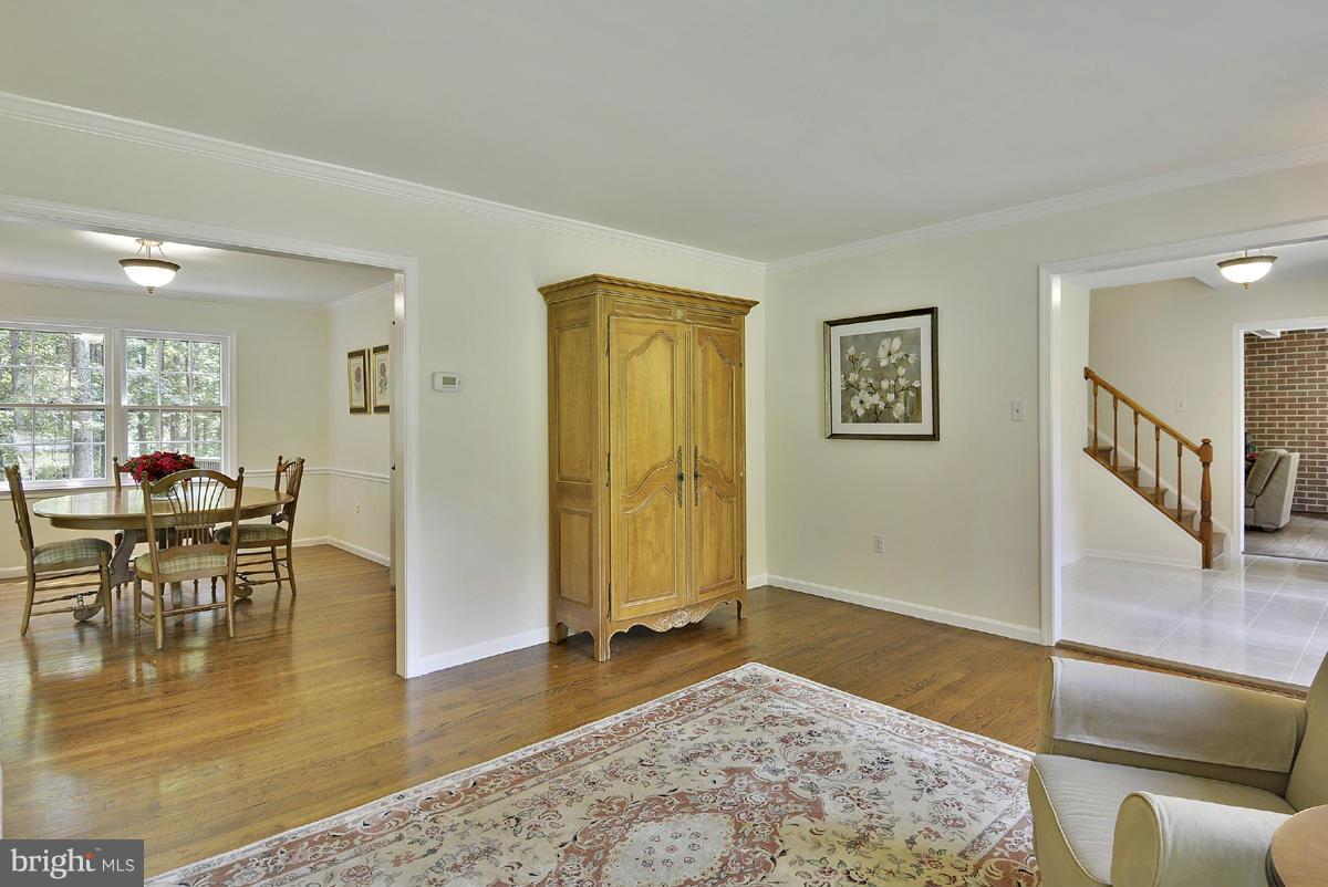 11017 Blue Roan Road Oakton, VA 22124 - Photo 10 of 30 Living Room Opens to Dining Room & Foyer