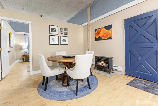 a view of a livingroom with furniture and a table