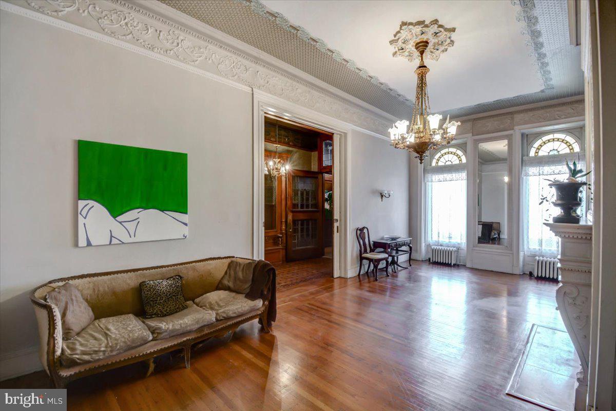 1718 Eutaw Place Baltimore, MD 21217 - Photo 11 of 65 Front windows frame custom wood work & pier mirror