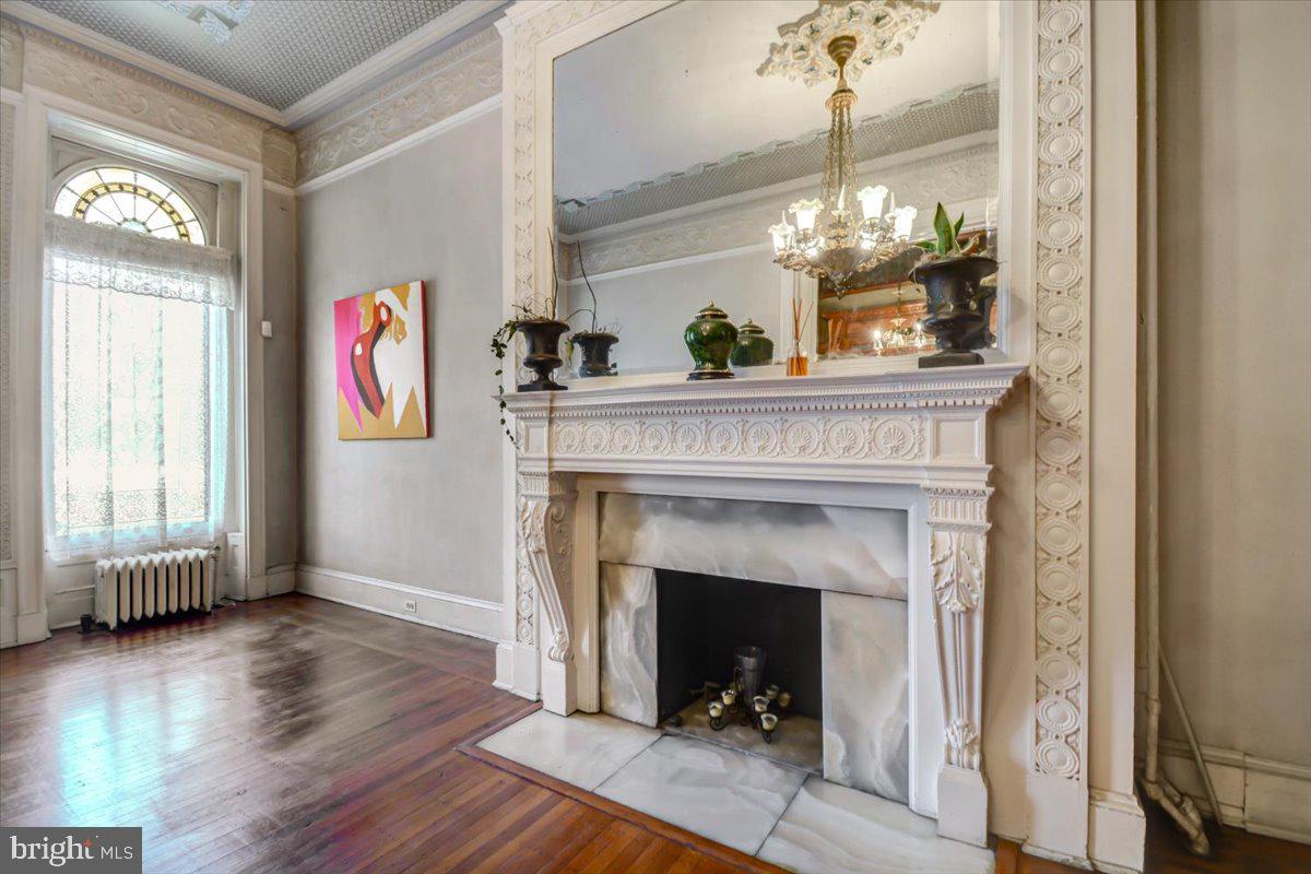 1718 Eutaw Place Baltimore, MD 21217 - Photo 12 of 65 2 flr to ceiling windows topped by stained glass