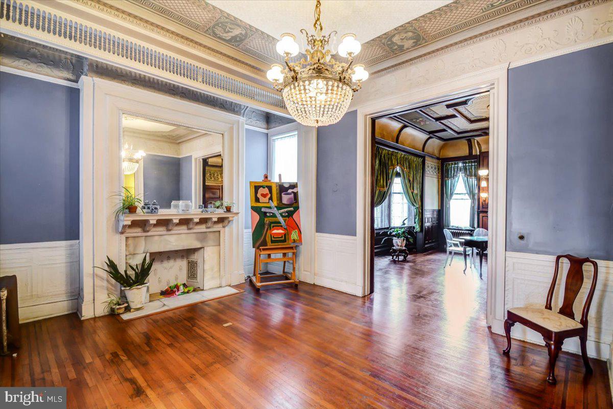 1718 Eutaw Place Baltimore, MD 21217 - Photo 14 of 65 Several Silk Screened ceiling montages throughout