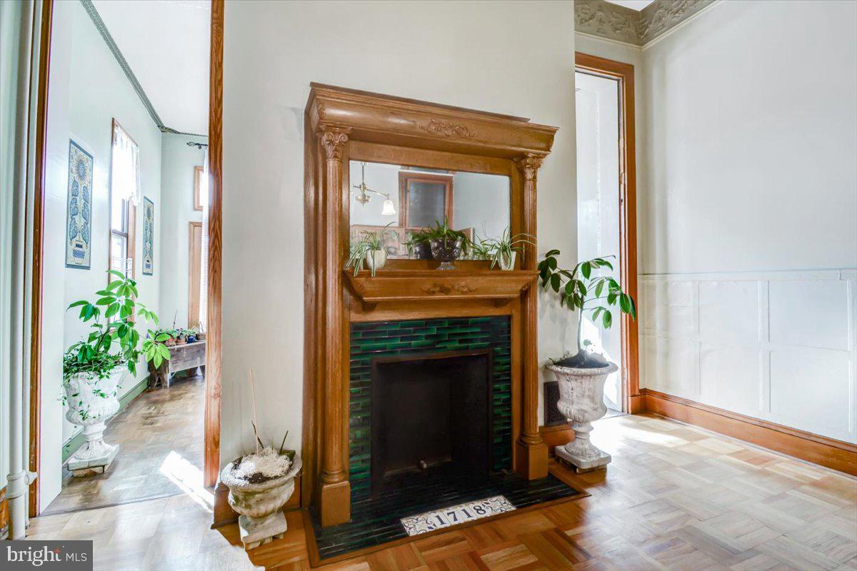 1718 Eutaw Place Baltimore, MD 21217 - Photo 18 of 65 Carved FP: elaborate tiles incl site specific art