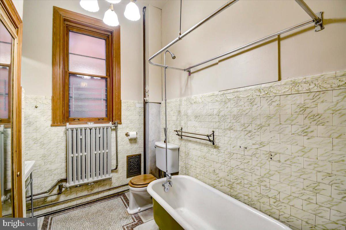 1718 Eutaw Place Baltimore, MD 21217 - Photo 22 of 65 Chandelier, Claw foot tub w/ abundance of storage