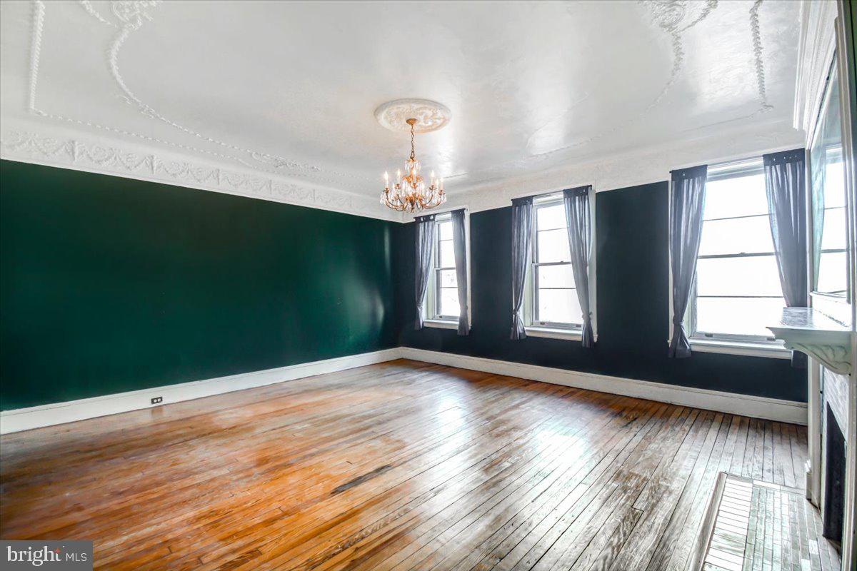 1718 Eutaw Place Baltimore, MD 21217 - Photo 37 of 65 BR4-molding along frieze ceiling to chandelier