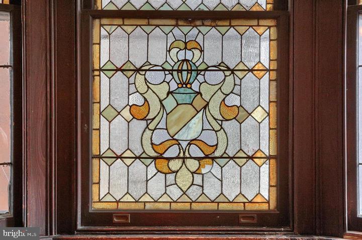 1718 Eutaw Place Baltimore, MD 21217 - Photo 42 of 65 Elegant shield stained glass window in Bath