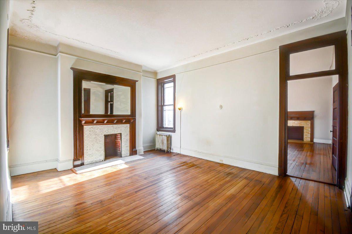 1718 Eutaw Place Baltimore, MD 21217 - Photo 43 of 65 BR5: hand plaster detailing ceiling, Tile & wd FP