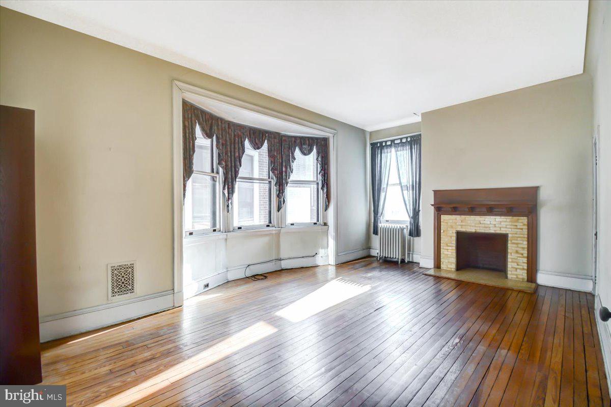 1718 Eutaw Place Baltimore, MD 21217 - Photo 46 of 65 BR6-Bright airy rm, Fireplace w/ tile & wood work