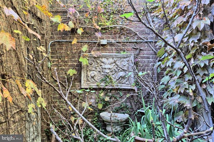 1718 Eutaw Place Baltimore, MD 21217 - Photo 59 of 65 Secret garden b/w house & garage w ornamentation