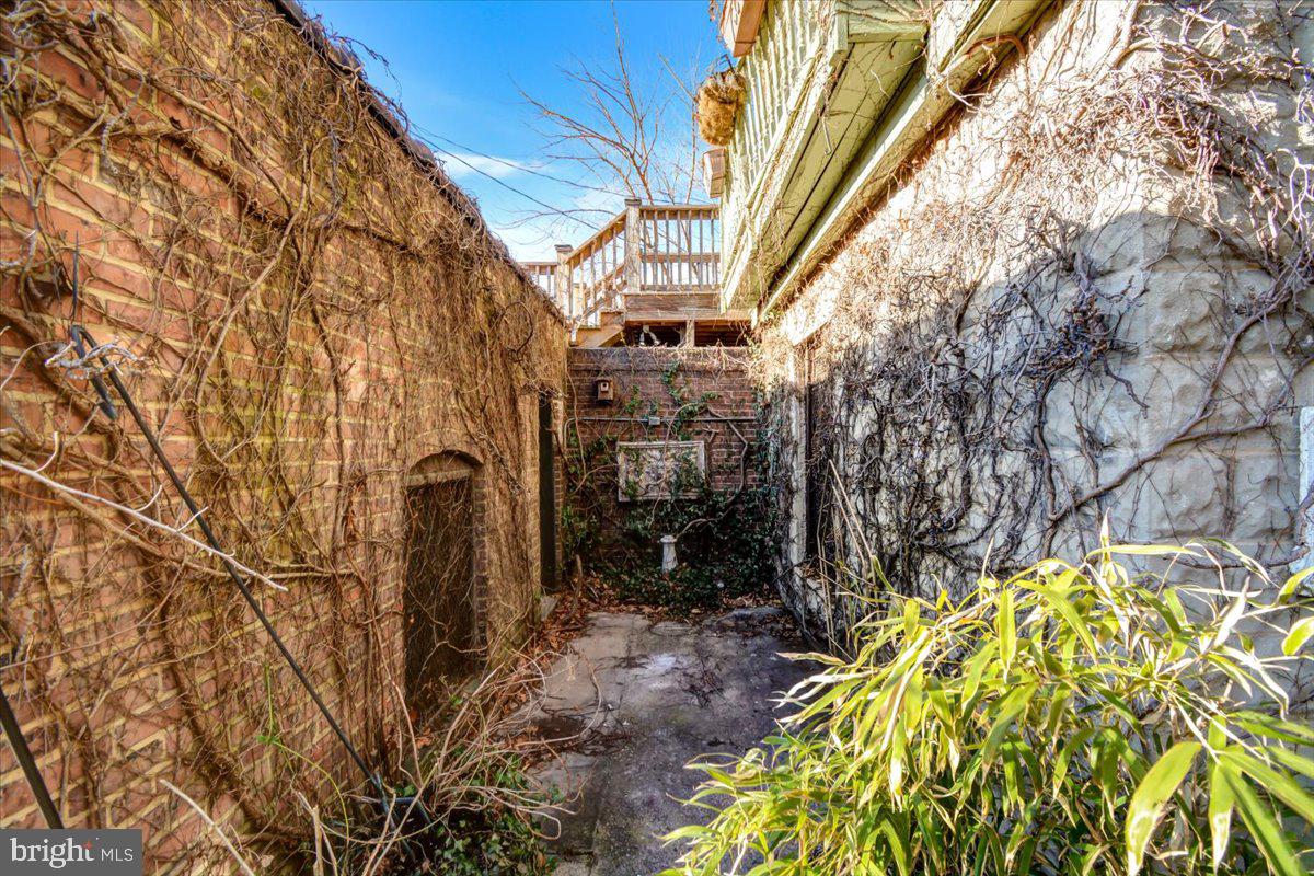 1718 Eutaw Place Baltimore, MD 21217 - Photo 63 of 65 Hardscape cont. behind porch for backyard access