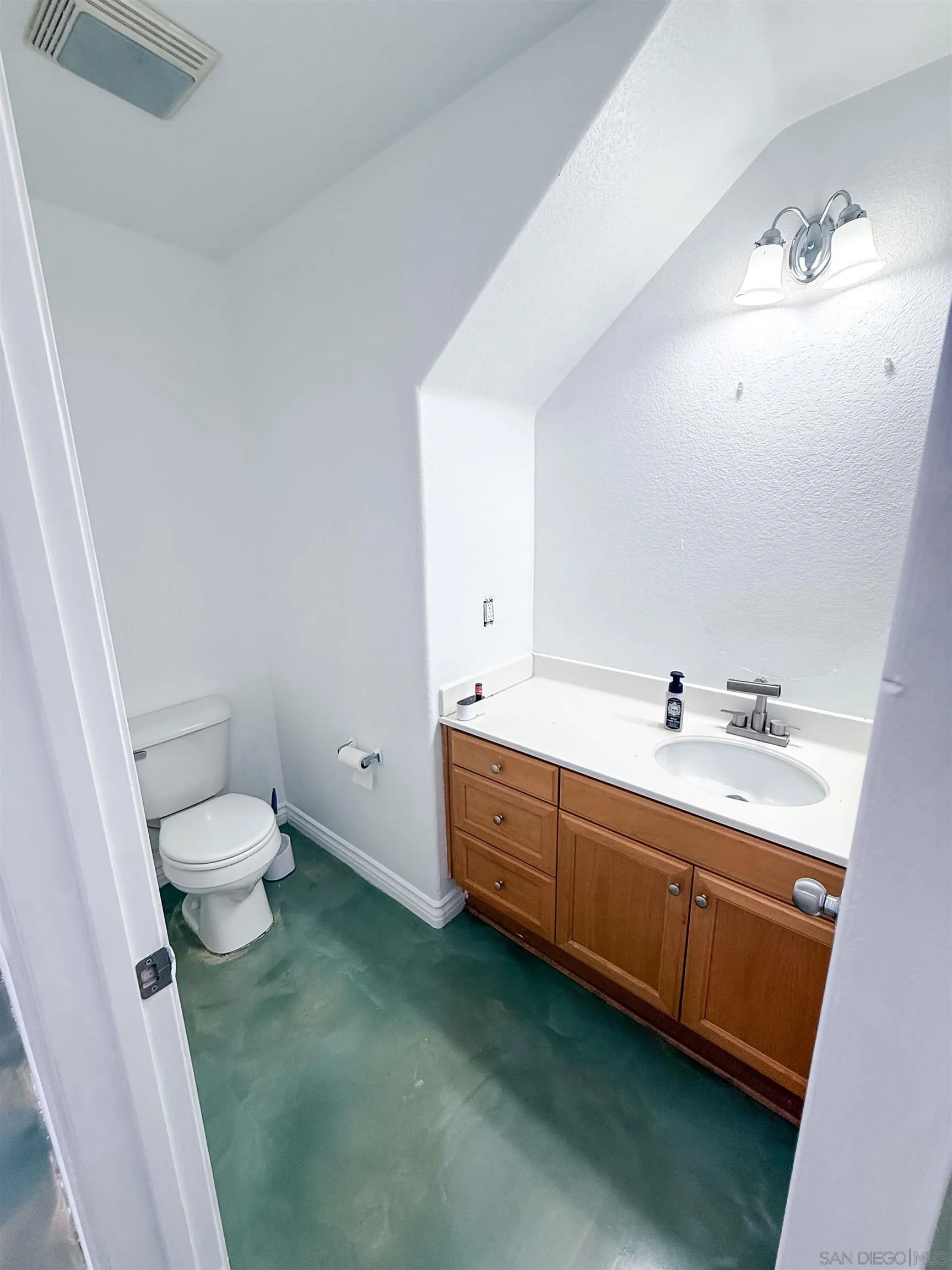1431 Trouville Lane, Unit 5 Chula Vista, CA 91913 - Photo 11 of 28 a bathroom with a double vanity sink toilet and a tub