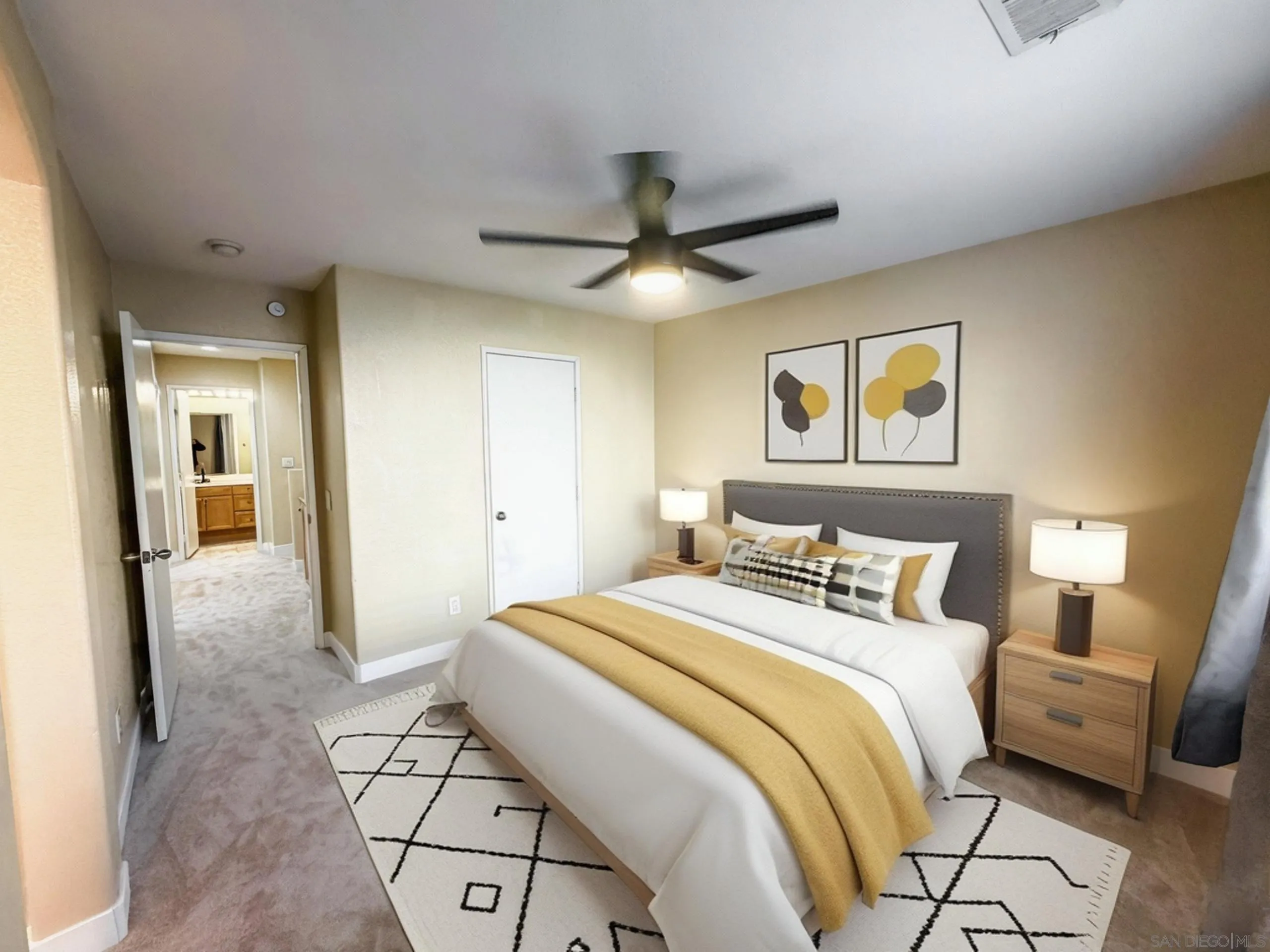 1431 Trouville Lane, Unit 5 Chula Vista, CA 91913 - Photo 12 of 28 a bedroom with a bed and a chandelier