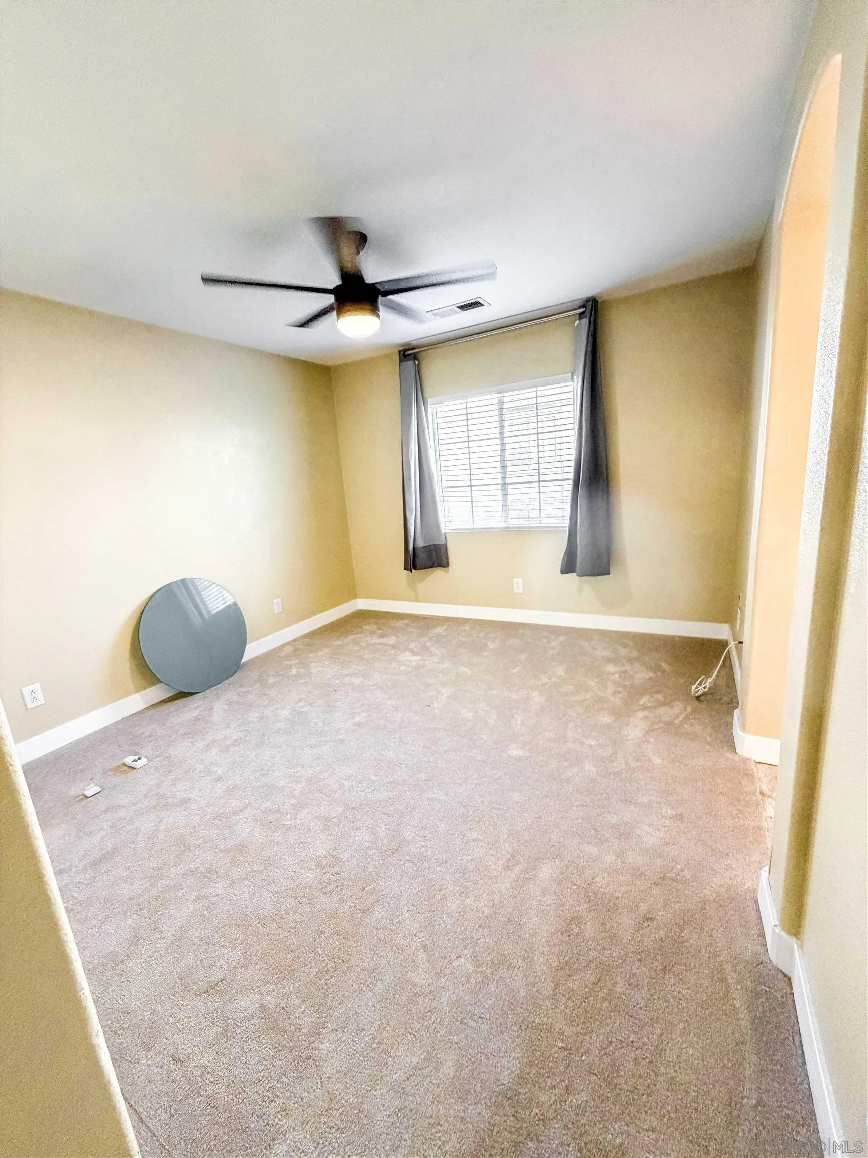 1431 Trouville Lane, Unit 5 Chula Vista, CA 91913 - Photo 14 of 28 a view of an empty room with a window