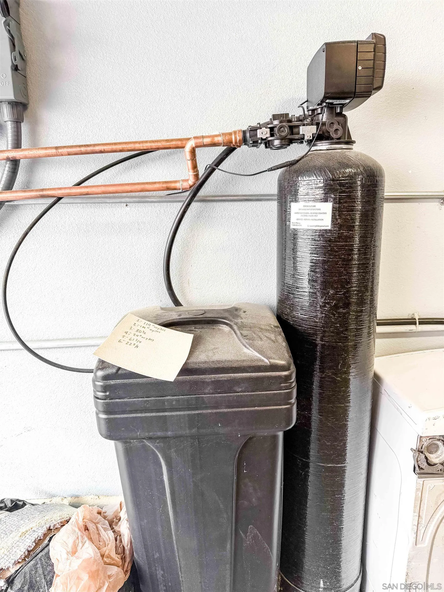 1431 Trouville Lane, Unit 5 Chula Vista, CA 91913 - Photo 27 of 28 a utility room with dryer and washer