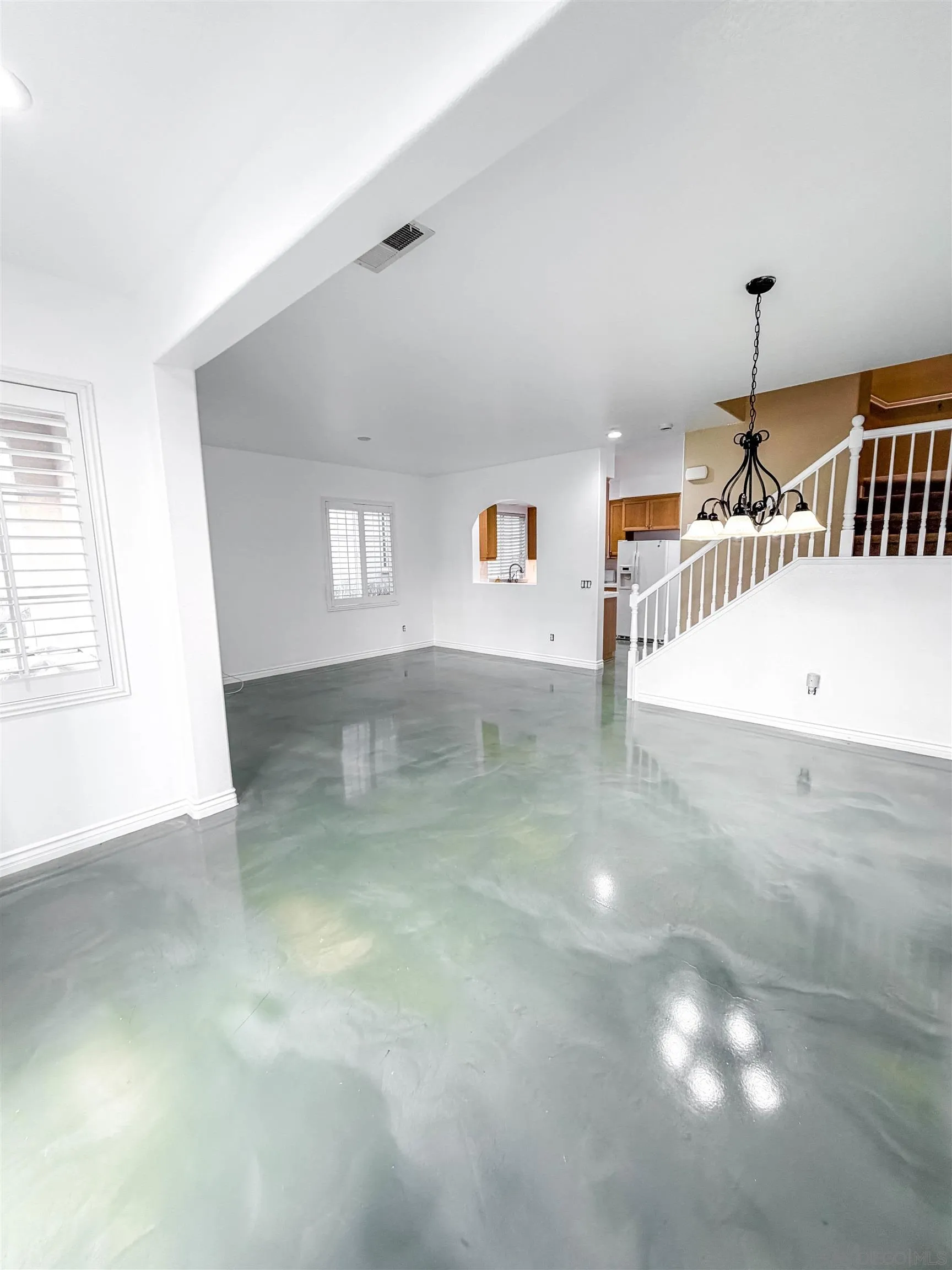1431 Trouville Lane, Unit 5 Chula Vista, CA 91913 - Photo 5 of 28 a view of an empty room with windows